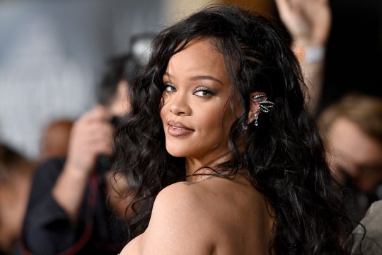 Rihanna Paired a Football Jersey With a Sheer Skirt and So Many Diamonds