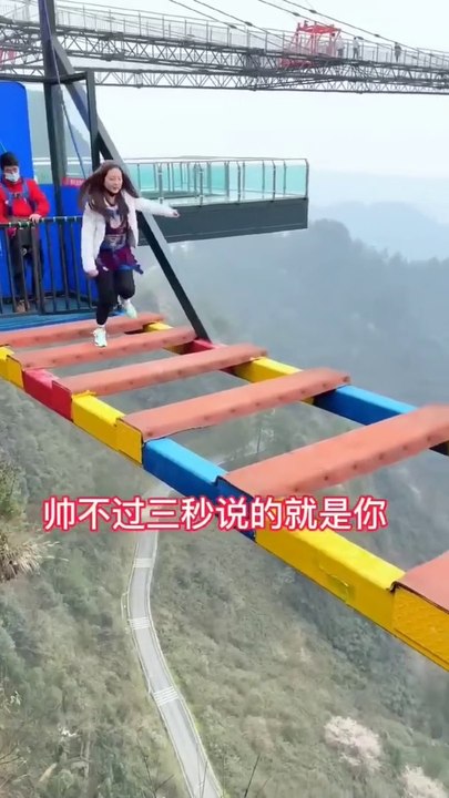 Incredible footageof a daredevil bungee jumper jumping from a bridge