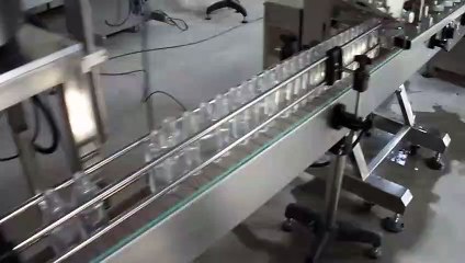 VKPAK المغزل شد خطي آلة تعبئة عصير برتقال بنظام PlC التلقائي غطاء بلاستيكي متوجا آلة الختم