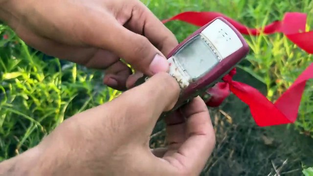 iPhone Vs Nokia Drop Test From 1000 Feet by drone