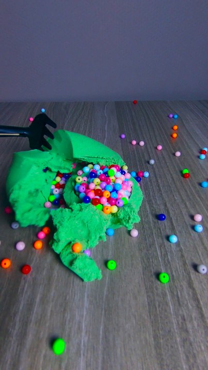 Beads in sand