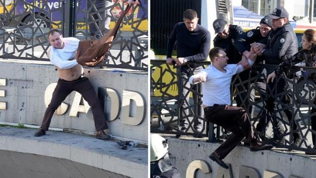 Ukraynalı eski polis, Taksim'de Savaşı durdurun diyerek intihar girişiminde bulundu