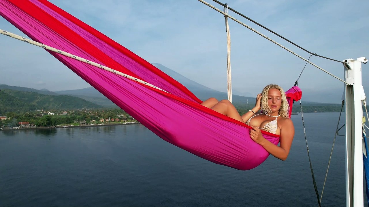 Extreme Hammocking Atop Sailboat