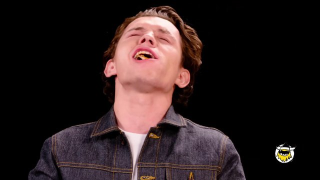 Tom Holland Calls for a Doctor While Eating Spicy Wings | Hot Ones | First We Feast