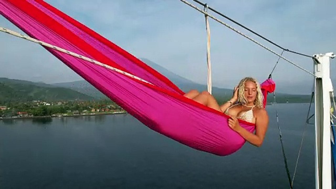Extreme Hammocking Atop Sailboat