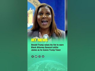 Donald Trump raises his fist to warn Black Attorney General Letitia James as he leaves Trump Tower