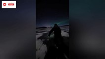 Ice skating on the lake under the full moon  & northern lights 