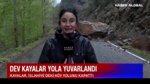 Dağlardan kopan dev kayalar yola yuvarlandı