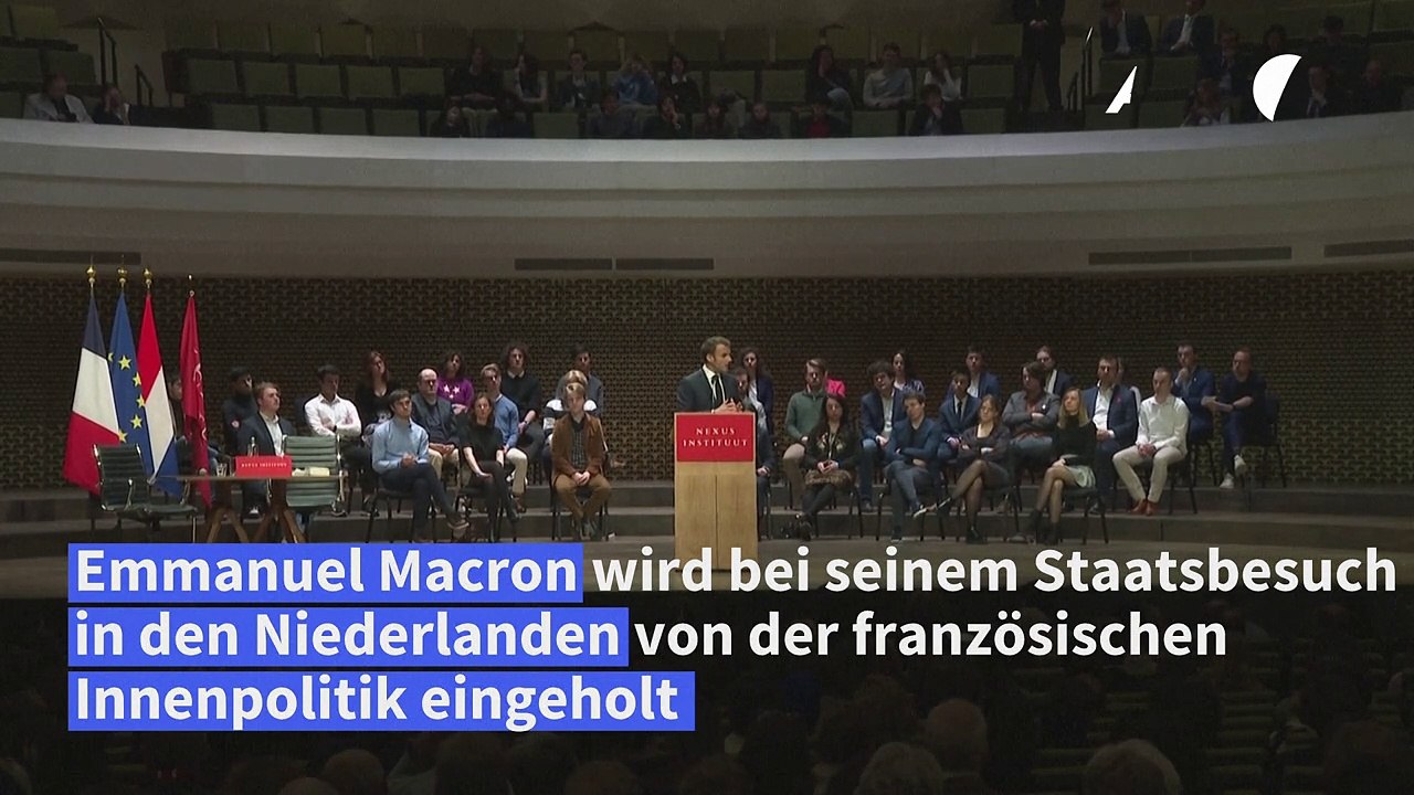 Macron bei Rede in Den Haag von Protesten unterbrochen