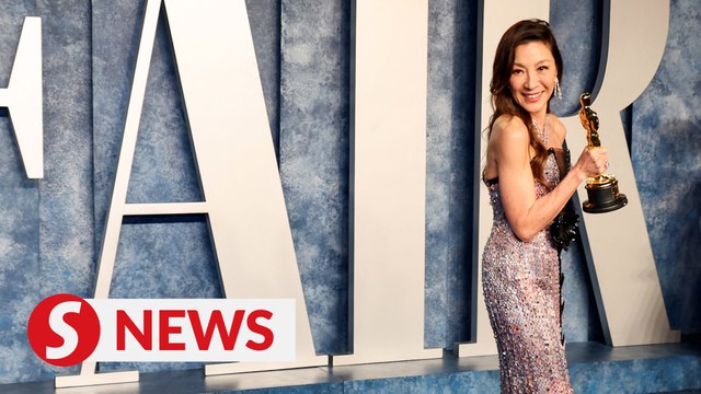 Michelle Yeoh back in Malaysia with her Oscar statuette