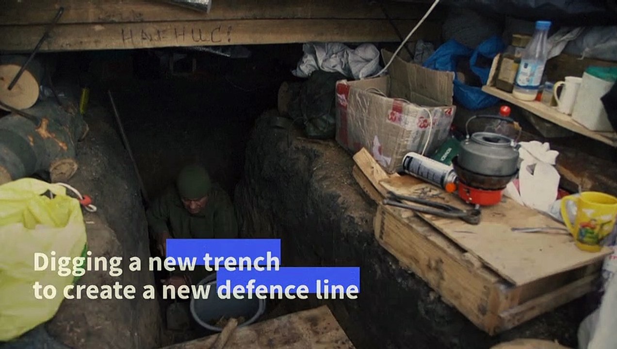 Ukrainian soldiers dig new trenches in case of heavy Russian assault