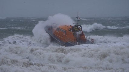 Lifeboats and helicopter search water near Brighton Pier