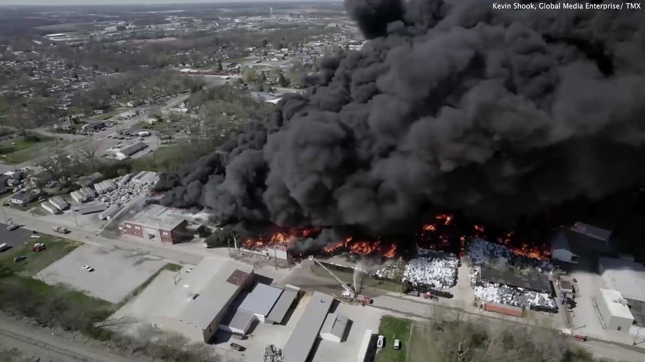 Drone footage shows thick plume of black smoke rising from fire at Indiana recycling plant