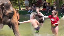 Children enjoying at the Elephant Sanctuary in Koh Samui, Thailand
