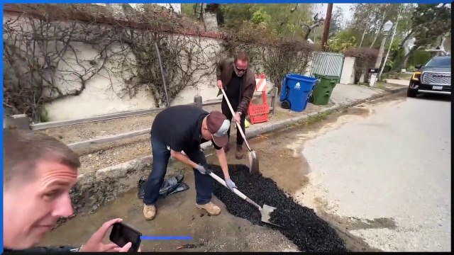 Arnold Schwarzenegger filmed filling pothole on his street