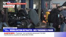 Réforme des retraites: des poubelles incendiées et du mobilier urbain dégradé sur le parcours du cortège parisien