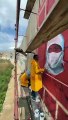 ريشة فنانين عرب و مسلمين ترسم الأمل خلف الجدار العنصري العازل في لبنان