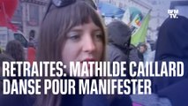 Retraites: Mathilde Caillard, membre du collectif Alternatiba Paris, danse pour manifester contre la réforme