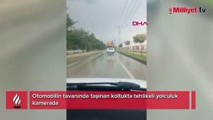 Otomobilin tavanında taşınan koltukta tehlikeli yolculuk kamerada