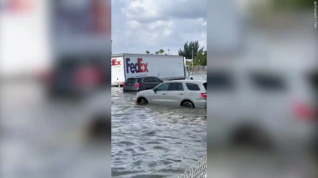 Videos shows vehicles almost completely submerged in floodwaters at Fort Lauderdale Airport