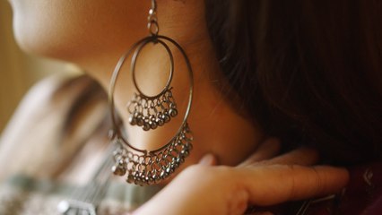 The Old-School Trick For Wearing Heavy Earrings Without Stretching Your Earlobes