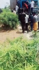 dumper rammed into a container filled with sand from behind