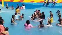 Video: गर्मी से बचने के लिए पहुंचे स्वीमिंग पूल में