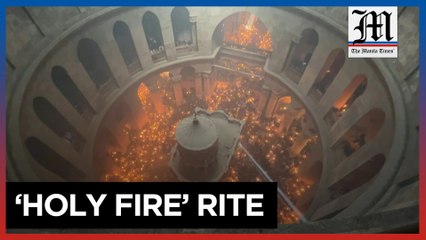 下载视频: Thousands in Jerusalem for Orthodox Easter 'Holy Fire' rite