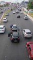 Good Man Helps Push Stalled Car Off Highway