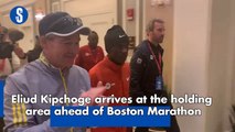 Eliud Kipchoge arrives at the holding area ahead of Boston Marathon