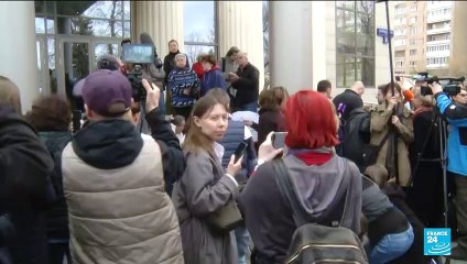 Top Kremlin critic convicted of treason, given 25 years