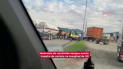 Motorista de caminhão-tanque acerta traseira de carreta na marginal da 101