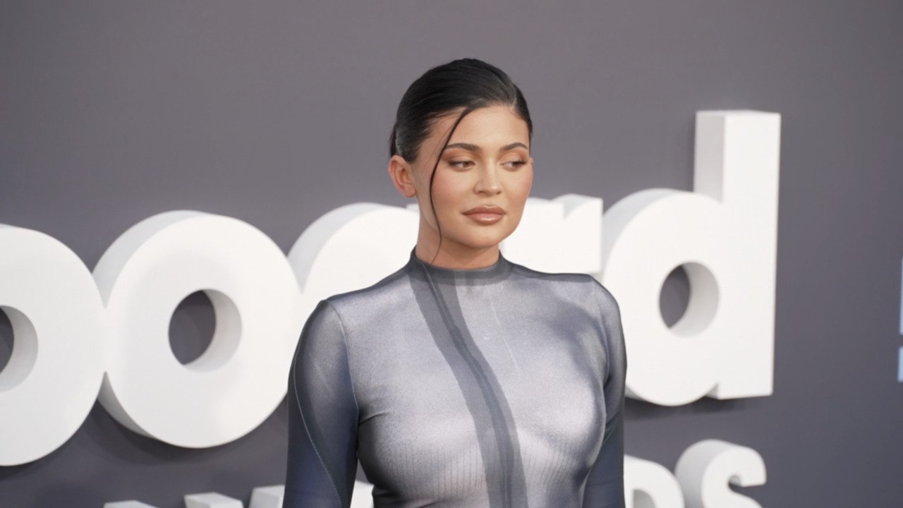 Kylie Jenner Just Made a Case For Neon While Sporting The Brightest Lime Green Romper