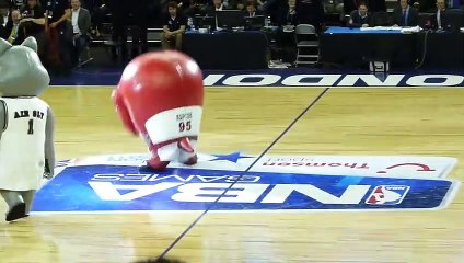 Toronto Raptors mascot eating cheerleader - FUNNY!