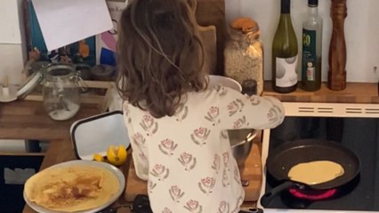 Talented 4 y/o girl performing her weekly ritual of making pancakes for family