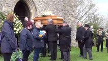 Paul O’Grady’s coffin carried into church as Battersea dogs form ‘guard of honour’