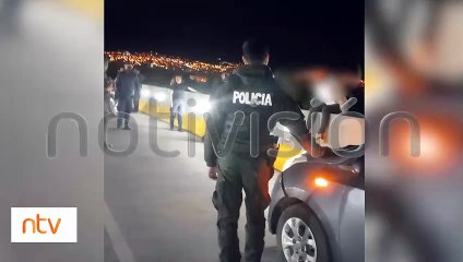 Policía impide que un joven se arroje del puente Beijing