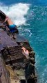 Wave Knocks Tourists Off Rocks in Hawaii