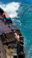 Wave Knocks Tourists Off Rocks in Hawaii