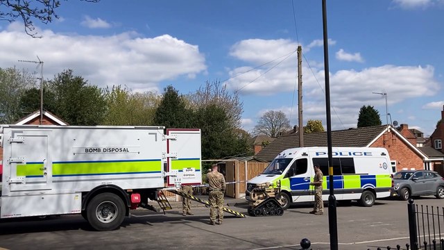 Three arrested as bomb squad descends on residential street following reports of explosives found