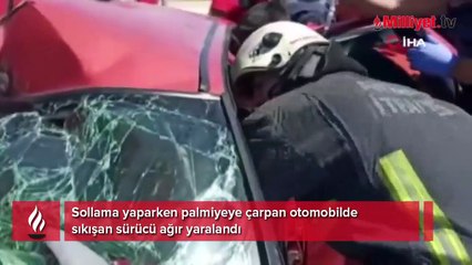 Sollama yaparken palmiyeye çarpan otomobilde sıkışan sürücü ağır yaralandı