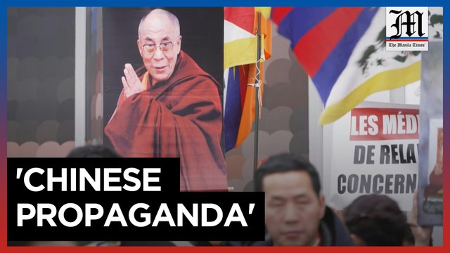 Hundreds of Tibetans gather in Paris to support Dalai Lama after controversial video