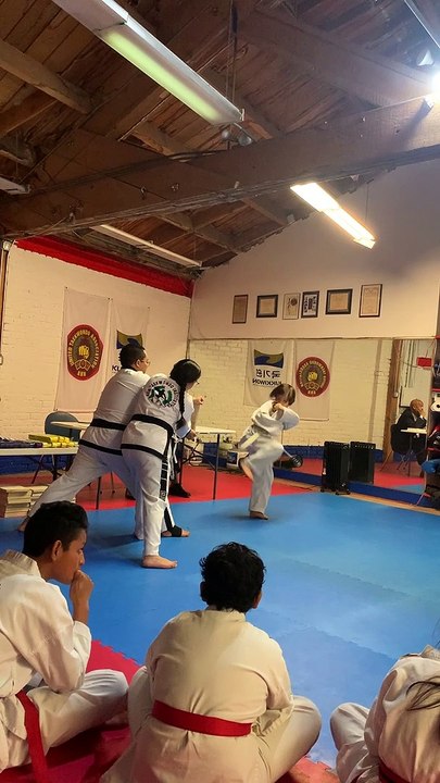 Kha, Taekwondo yellow belt test, board breaking, 1st attempt. March, 2023.