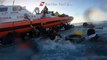 Italian coast guard release video of dramatic rescue of migrants whose boat sank in the Mediterranean