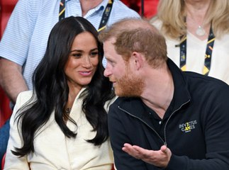 Meghan Markle Wore a Bright Pink Set While Getting Caught on the Kiss Cam With Prince Harry