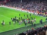 Players celebrate on the pitch as Sheffield United are promoted to the Premier League