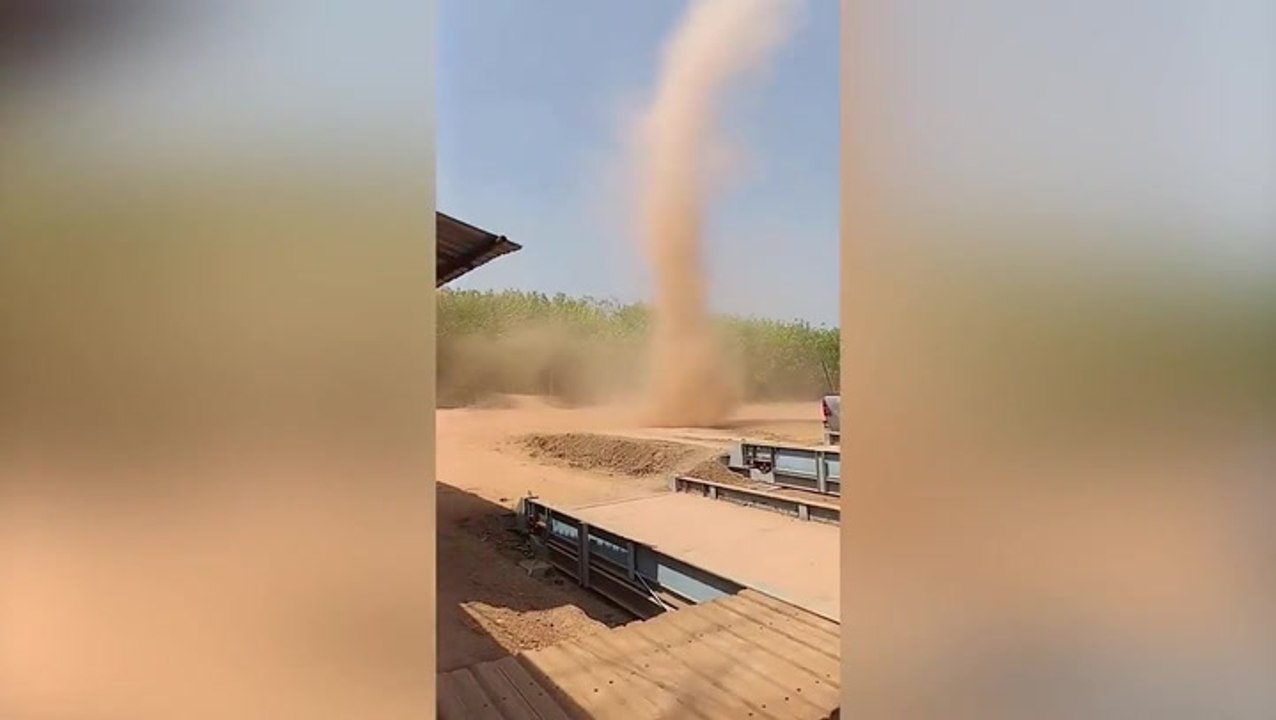 Terrifying moment dust devil sweeps towards house in Thailand