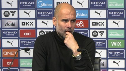 Guardiola delighted as City grasp title initiative with Arsenal win