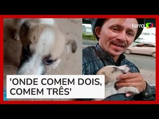 Motociclista viraliza ao adotar filhote abandonado um dia após seu cão morrer