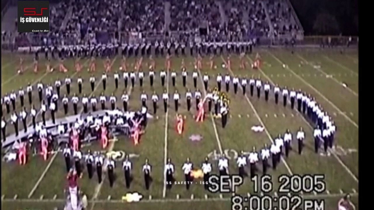 Marching tubas stumble, fall like dominoes